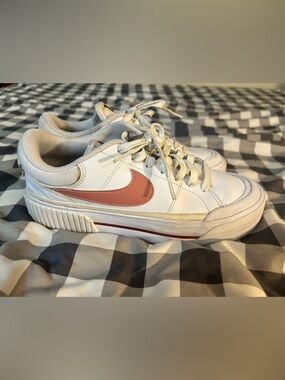 Nike White Leather Sneakers with Rose Swoosh